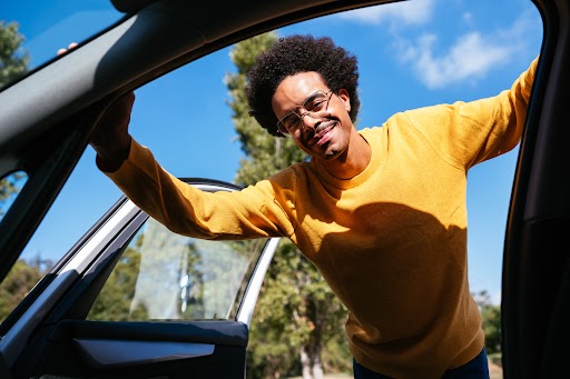 image of a man outside the car